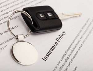 car keys and insurance form
