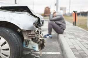 sitting on curb after wreck