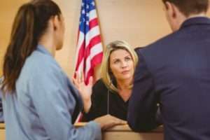 Judge speaking to lawyers