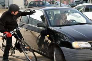 Car running into bicycle