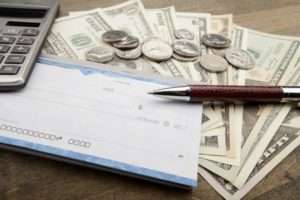 Checkbook with money