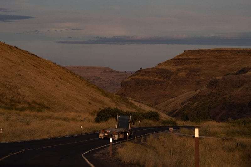 Truck driving through hills