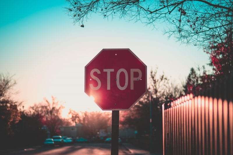 Stop sign at sunrise