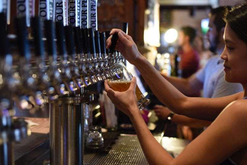 bartender pooring beer