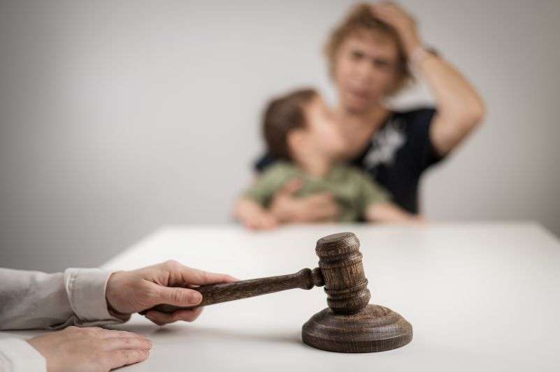 woman and child with judge