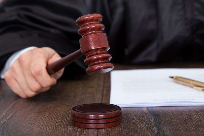 judge pounding gavel