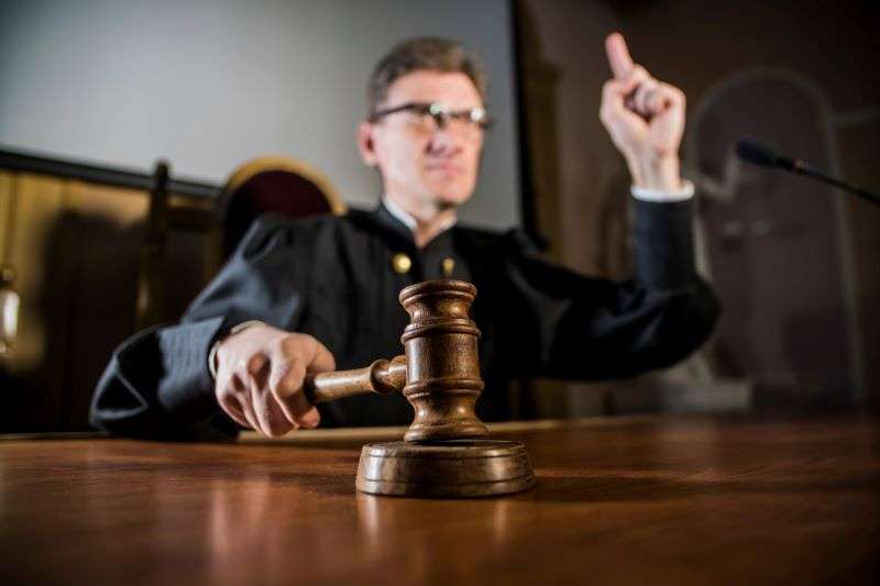 judge pointing finger