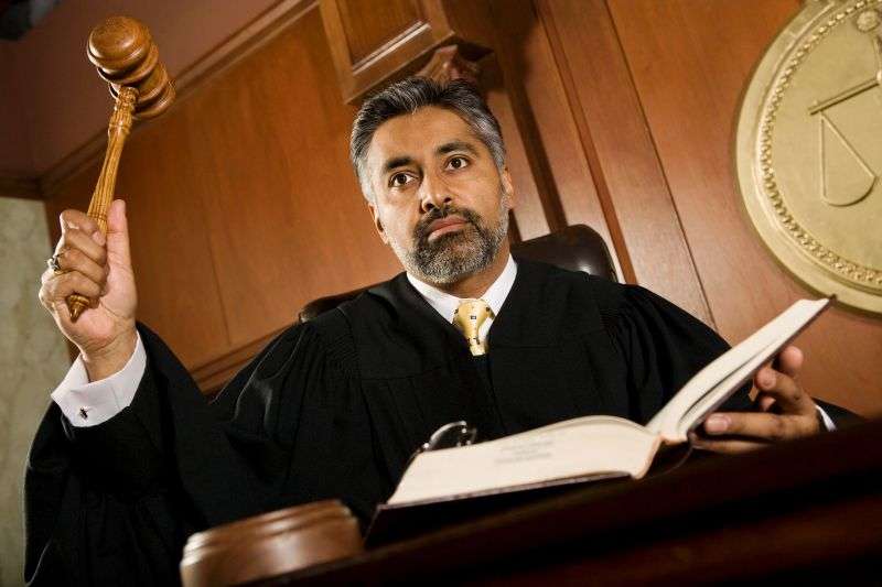 judge raising gavel