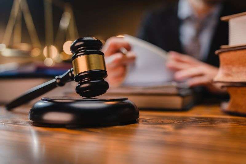 judge reading behind gavel
